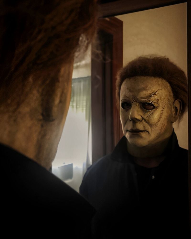 Michael Myers 2018 mask and coveralls captured in a chilling mirror moment — suited up and ready for Halloween night. From The Terror Lab.