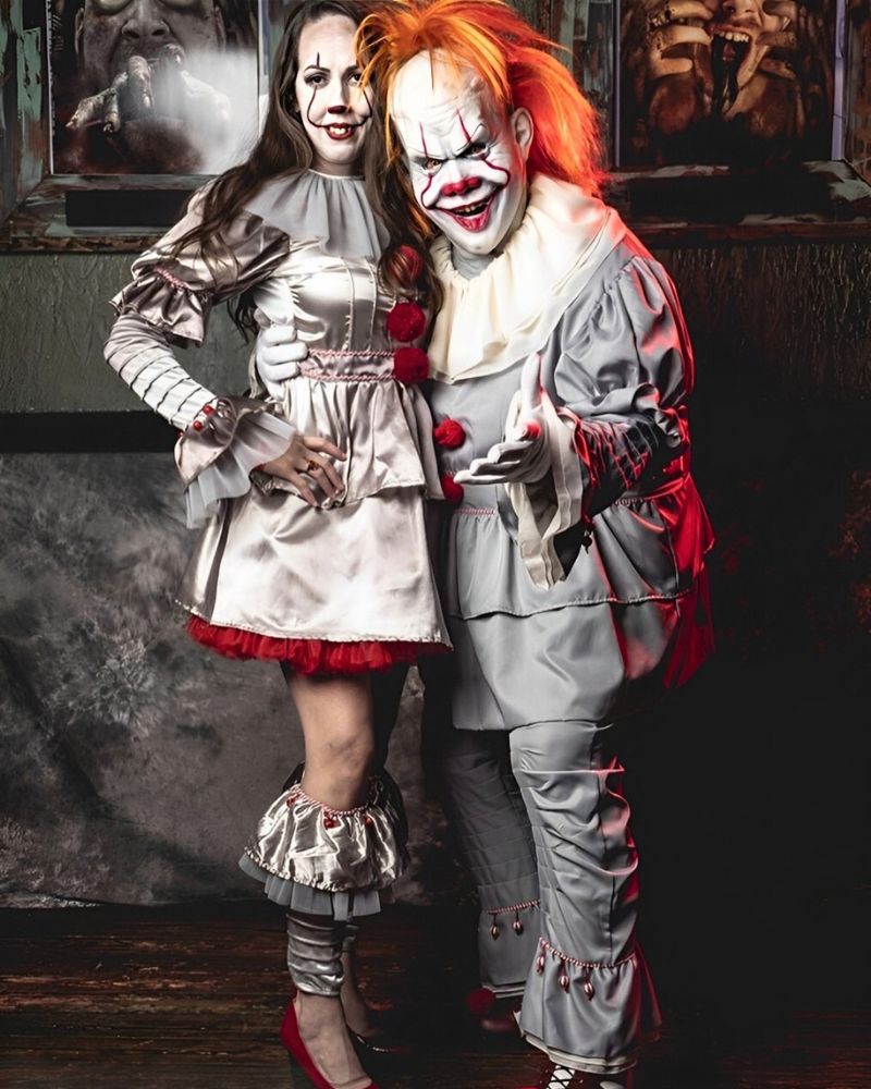 Pennywise realistic mask and costume worn as a matching Halloween look during a horror-themed party — The Terror Lab.