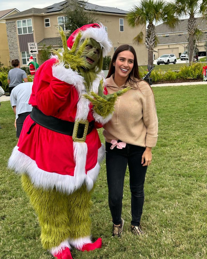 The Stealer of Christmas mask and furry costume at a festive holiday event, blending Halloween mischief with Christmas cheer — The Terror Lab